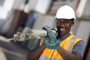 Public construction worker wearing a hardhat