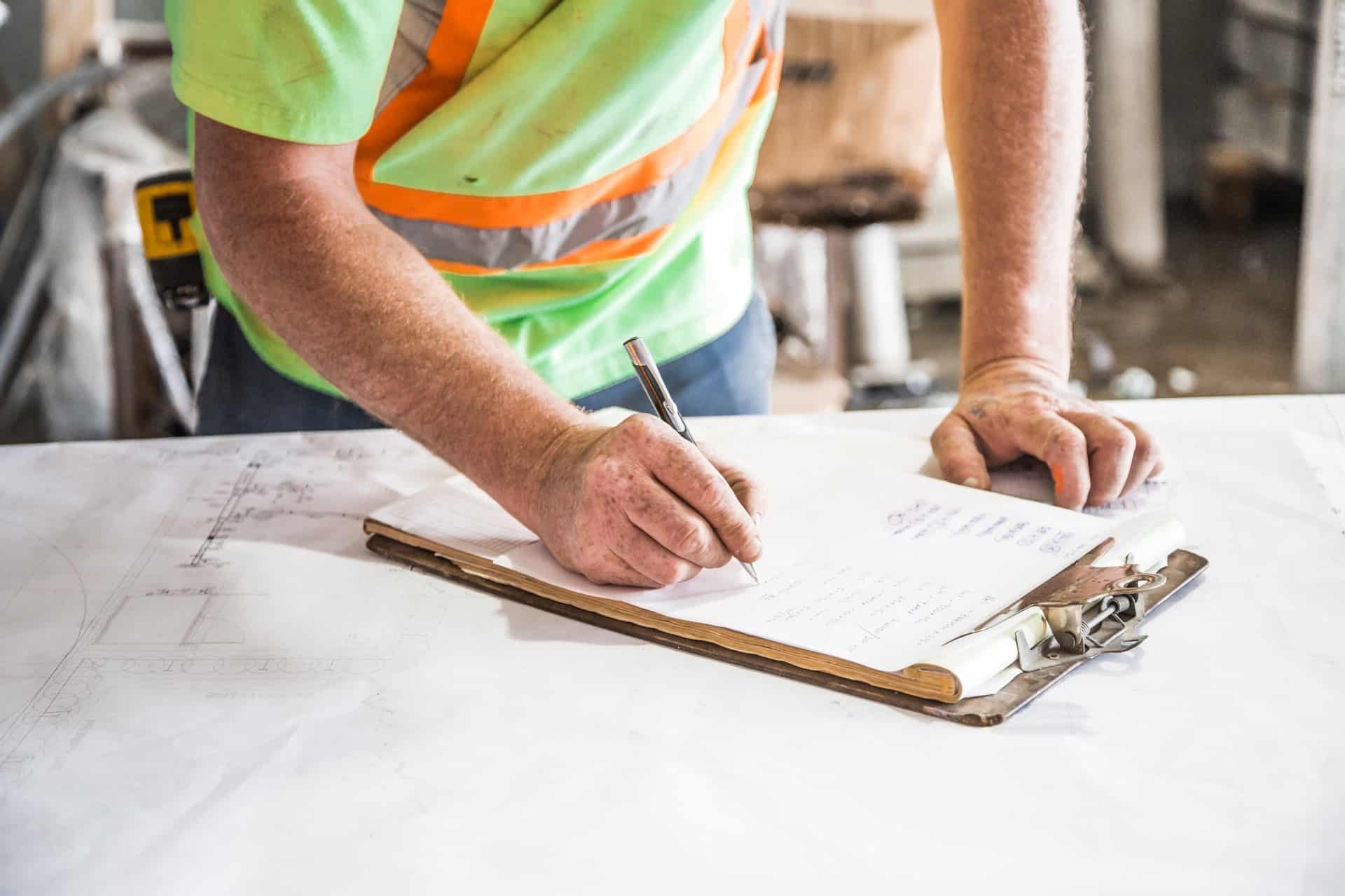 construction-worker-signing-contract